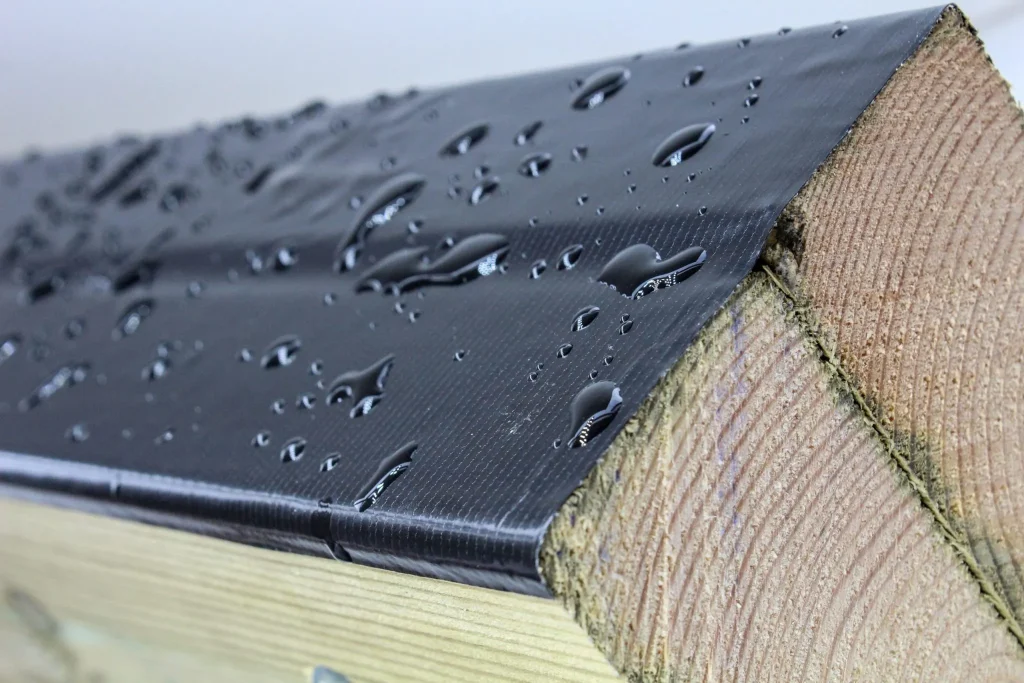 An image of decktape layered over 2 joists.