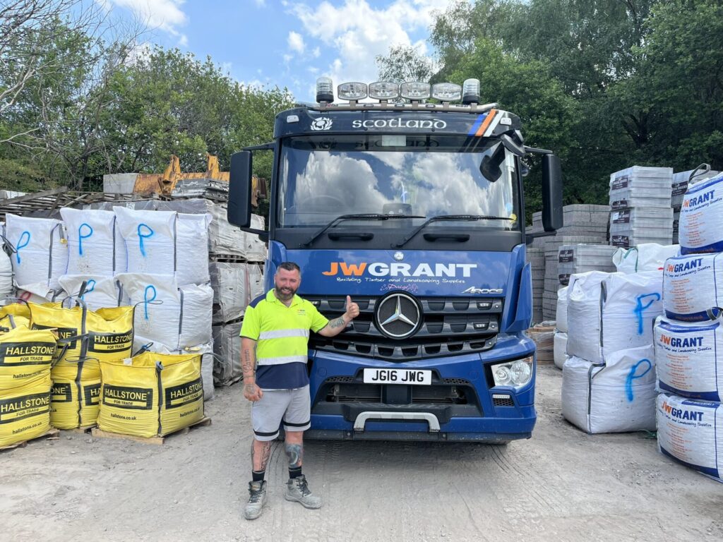 A man standing with JW Grant